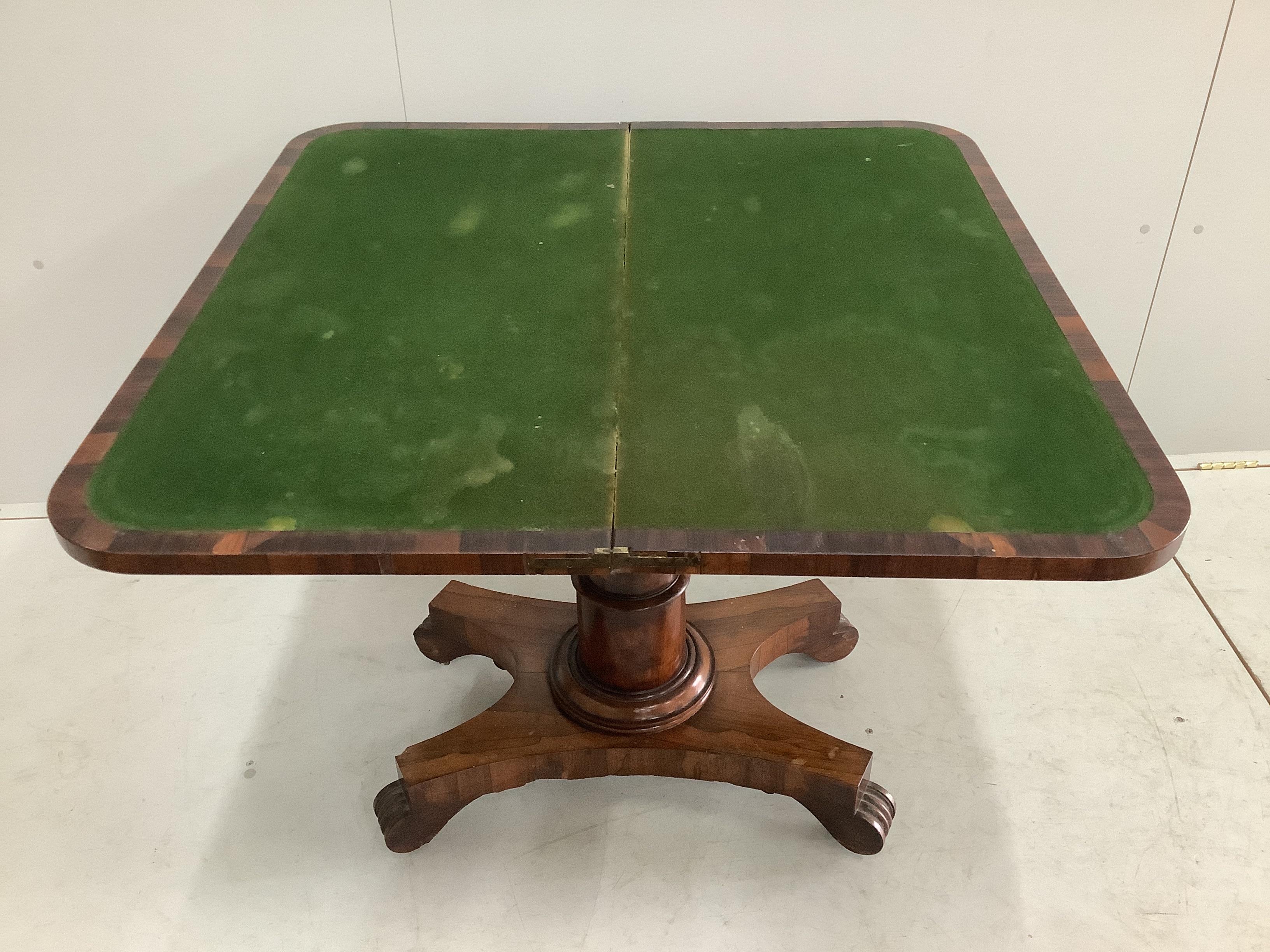 An early Victorian rectangular rosewood folding card table, width 90cm, depth 44cm, height 75cm. Condition - poor